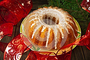 An apple bundt cake with caramel glaze and frosting, holiday cuisine