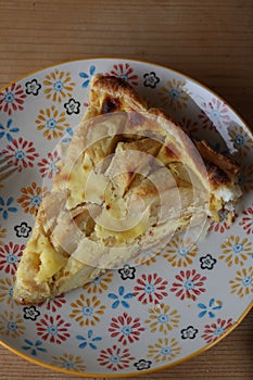 Apple cake on colorful plate