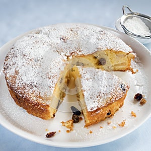 Apple Cake with Sultanas on White Plate Cut