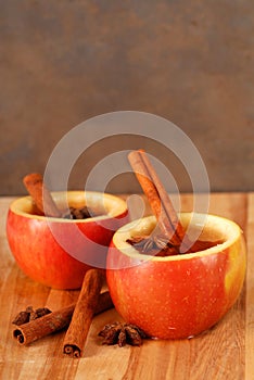 Apple cider in hollowed out apple photo