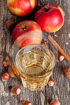 Apple cider or juice in a glass, close-up