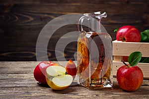 Apple cider vinegar and fresh red apple