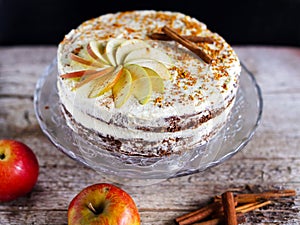 Apple cinnamon layered cake with buttercream icing and bee polen photo