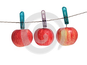 Apple on clothes peg