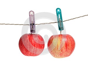 Apple on clothes peg