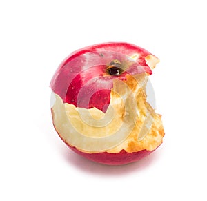 Apple core. Bitten apple.