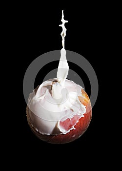 Apple covered with milk
