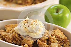 Apple crisp upclose whipped cream cinnamon