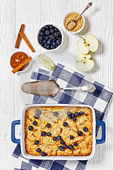 Apple Crumble topped with fresh berries, top view