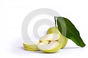 Apple cut in slices and half with leave