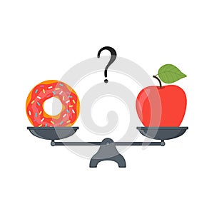 Apple and doughnut on scales. Diet concept. Healthy and unhealthy food. Weight loss, healthy lifestyle, proper nutrition