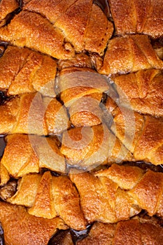 Apple dumplings baked in a dish, overhead shot photo