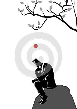 Apple falling dawn to the head of a thinking businessman