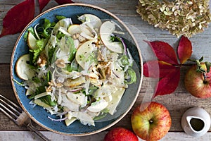 Apple and fennel salad with walnuts and greens