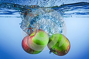 Apple Fruit Falling into the water
