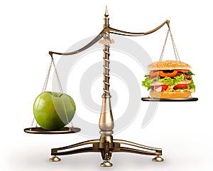 Apple and hamburger on scales conceptual