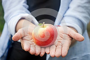 Apple on hand