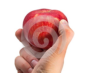Apple in a hand on a white background