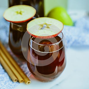 Apple homemade Kombucha in glass beakers