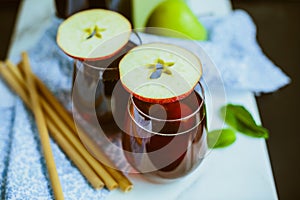 Apple homemade Kombucha in glass beakers