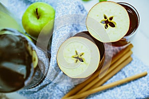 Apple homemade Kombucha in glass beakers