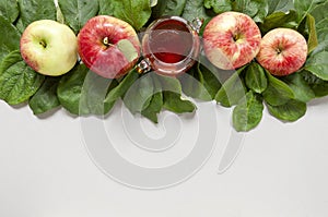 Apple and honey. Concept for Rosh Hashanah the Jewish New Year. Close up on light blue background. Top view, close up, flat lay