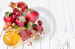 Apple and honey, traditional food of jewish New Year - Rosh Hashana. Copy space background.