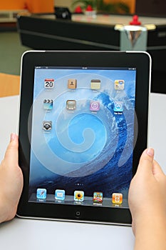 Apple iPad on hand