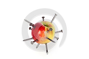 Apple with iron nails