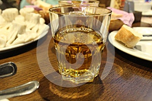 Apple juice in a close-up glass in a cafe restaurant. Drinks natural drinks