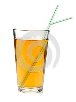 Apple juice in a glass with drinking straws