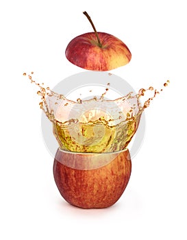 Apple juice splash inside red apple isolated,