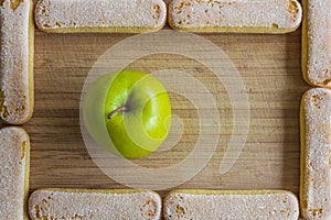 Apple and ladyfinger biscuits, food frame