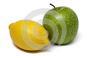 Apple and lemon isolated on white background
