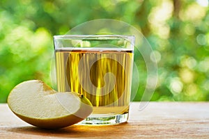 Apple lobule and glass on the table