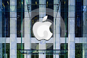 Apple Logo hung in the glass cube entrance to the famous Fifth Avenue Apple Store in New York.