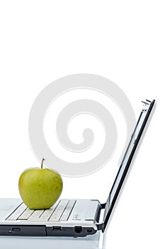 Apple lying on a keyboard