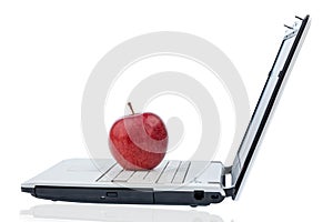 Apple lying on a keyboard