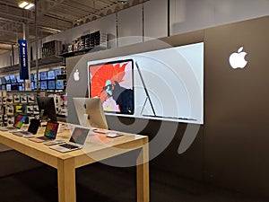 Apple Macbooks Laptops and Computers with siri assistant on display