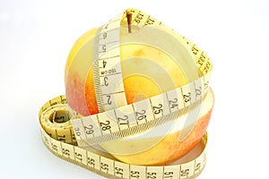 Apple with measure tape #2 photo