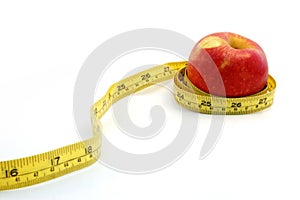 Apple with measure tape