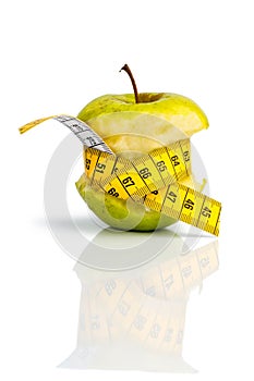 Apple with measuring tape