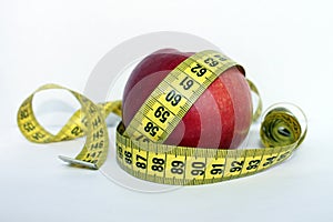 Apple with measuring tape