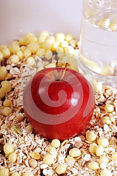 Apple on muesli background