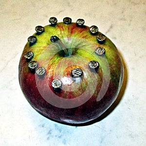 Apple with nails