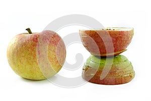 Apple in natural beauty and disfigured by cosmetic surgey photo