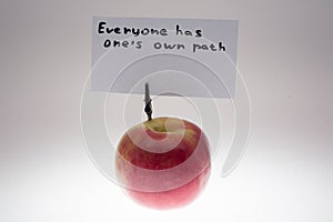 Apple and note, white background, fruit and freshness