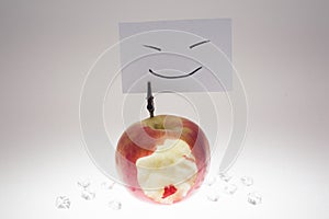 Apple and note, white background, fruit and freshness photo
