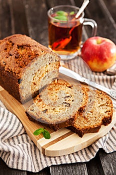 Apple nut cake on wooden board