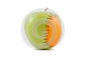 Apple with orange implant
